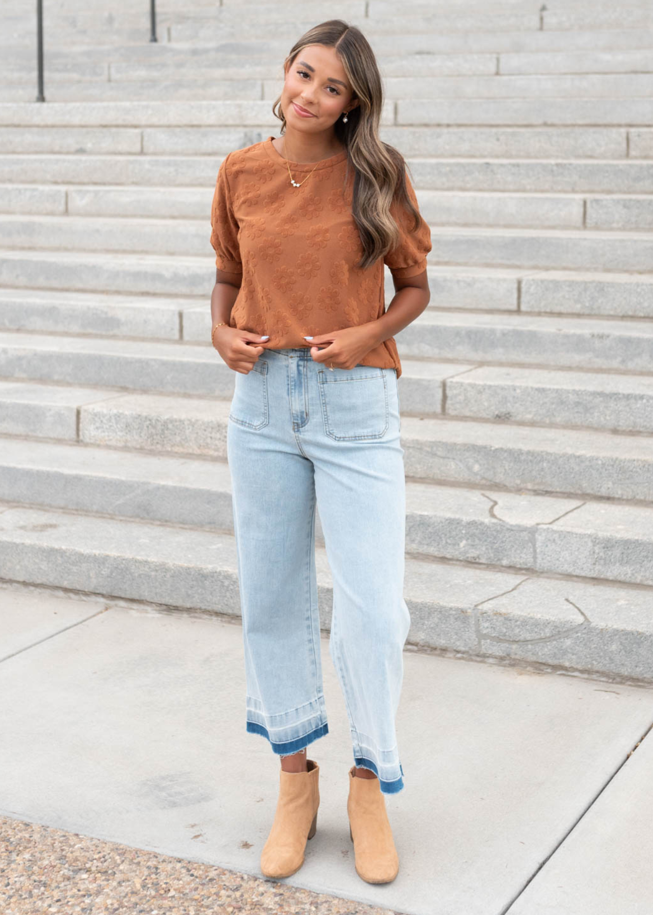 Front view of the cinnamon floral pattern top