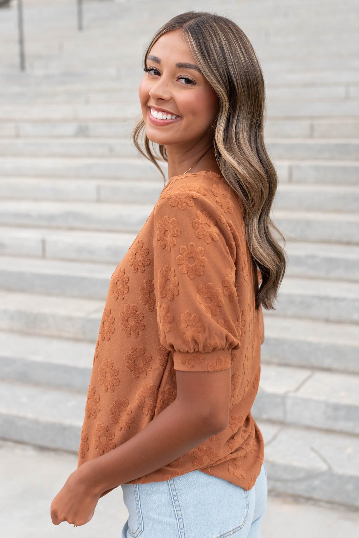 Side view of the cinnamon floral pattern top