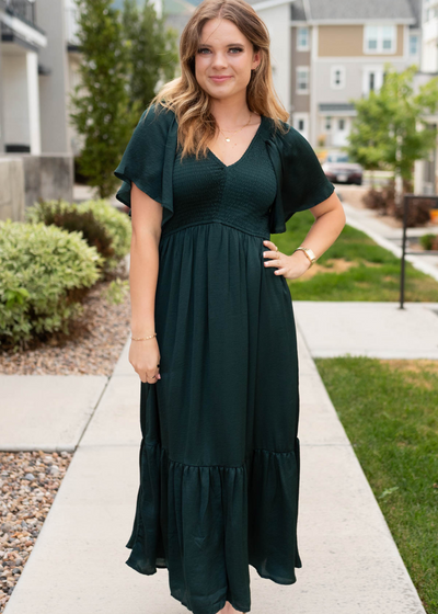 Smocked bodice on the emerald satin dress