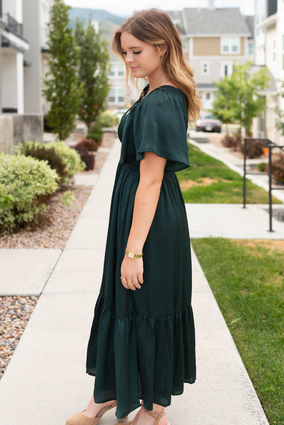 Side view of the emerald satin dress