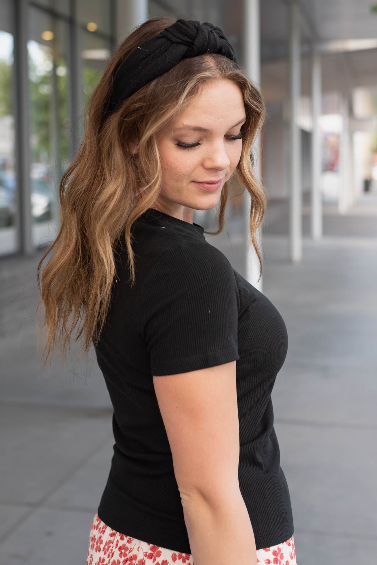 Side view of the black ribbed top