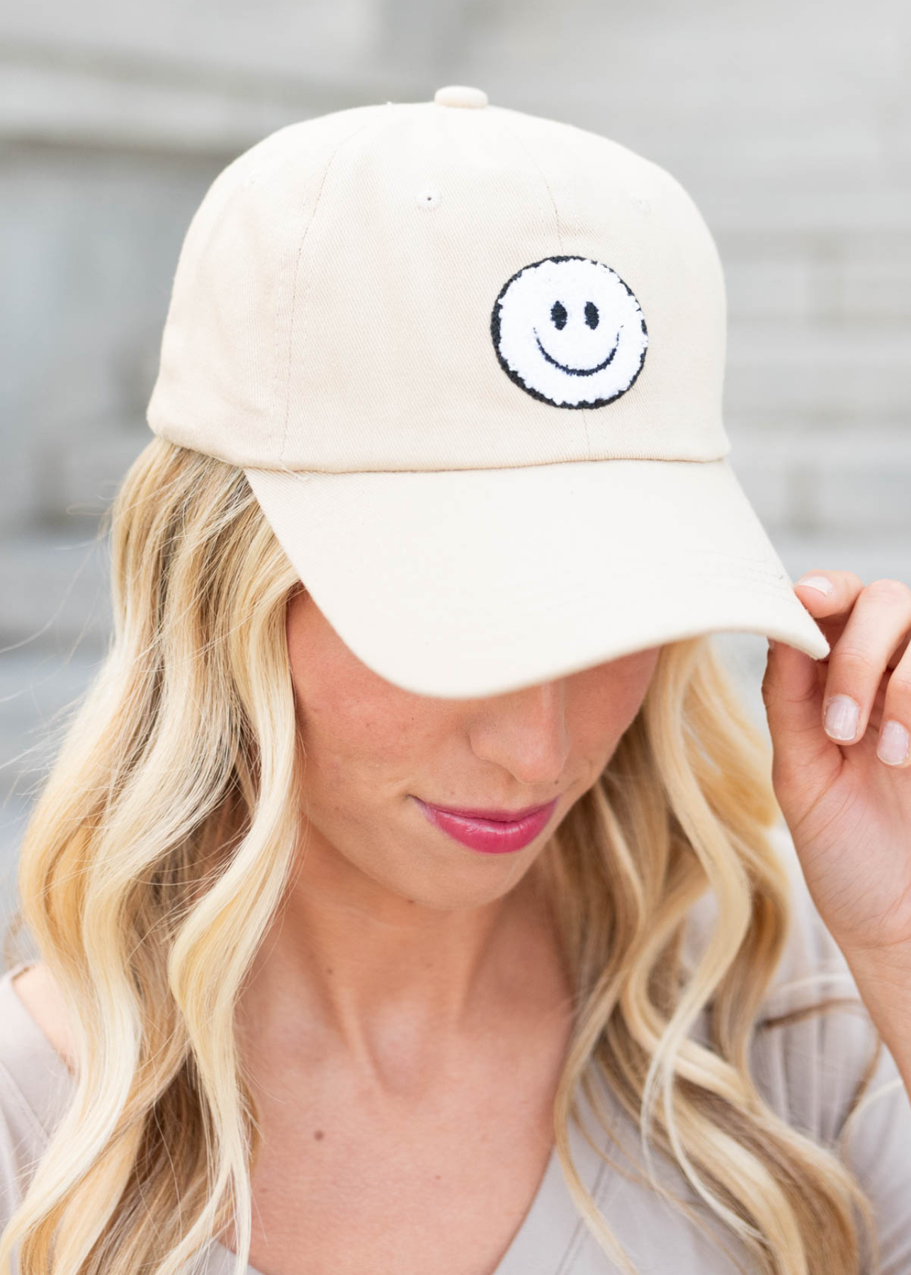 Beige sherpa happy face hat