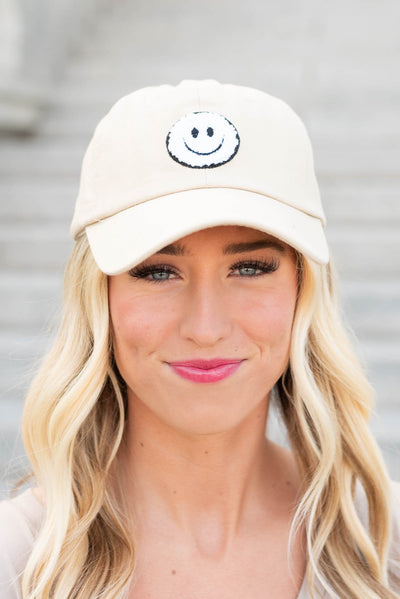 Beige sherpa happy face hat with white happy face