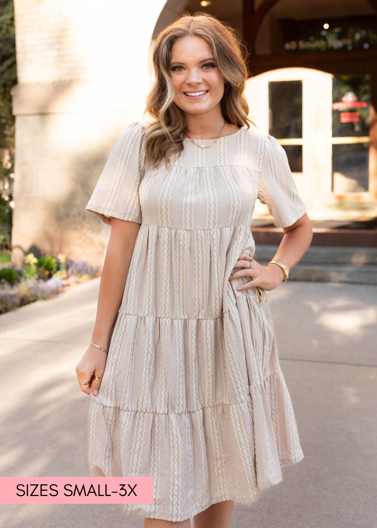 Tan textured dress with tiered skrit