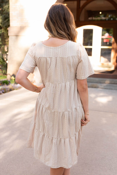 Back view of the tan textured dress