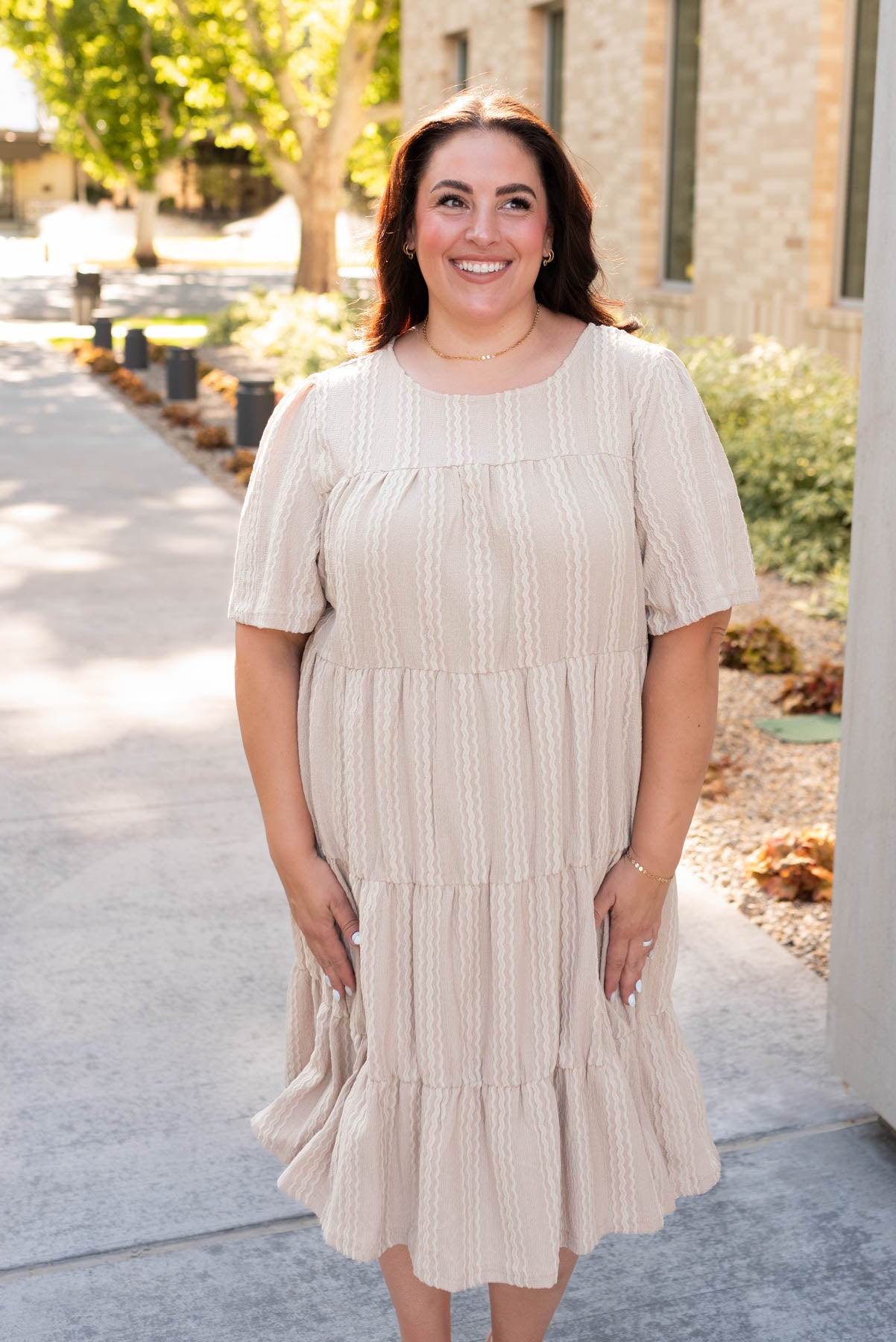 Plus size tan textured dress with short sleeves