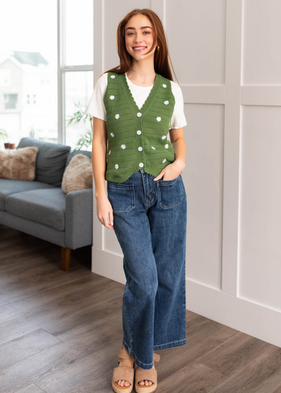 Green knitted sweater with a v-neck