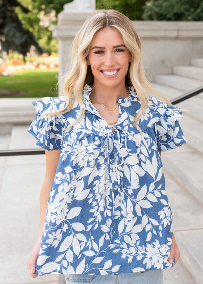Blue floral ruffle top with short sleeves
