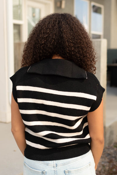 Back view of the black taupe stripe sweater