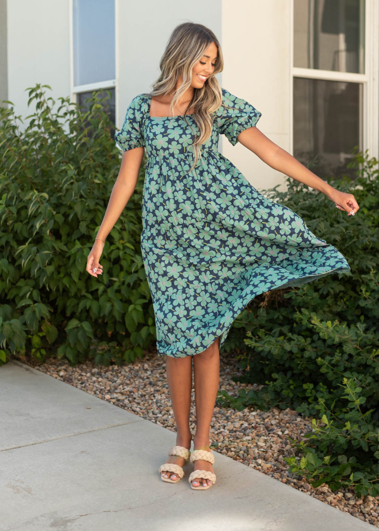 Dark green dress with a floral print