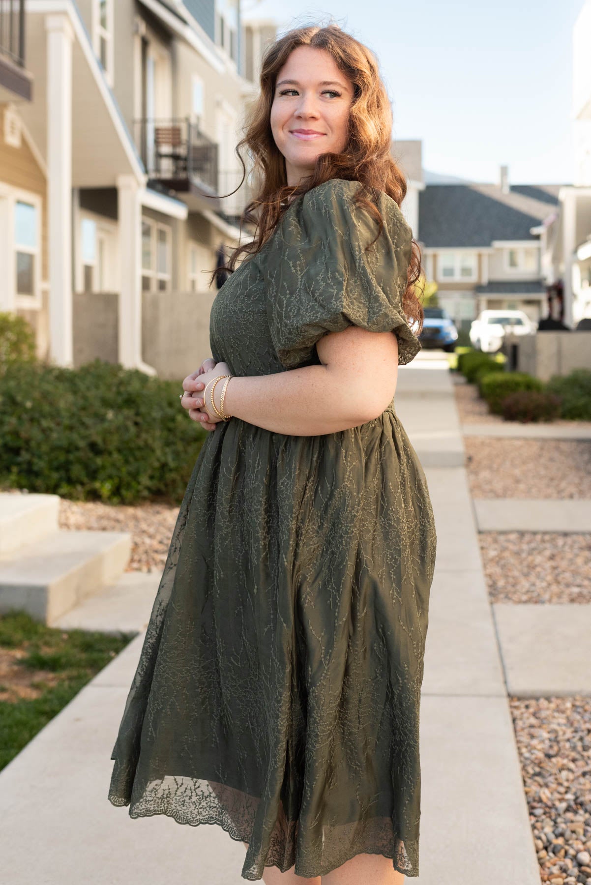 Side view of the olive embroidered square neck dress in plus size