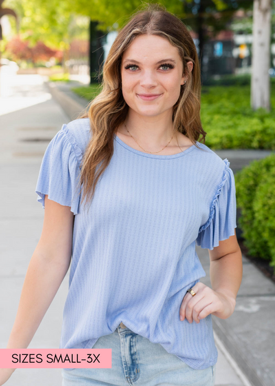 Light blue textrued top with short ruffle sleeves