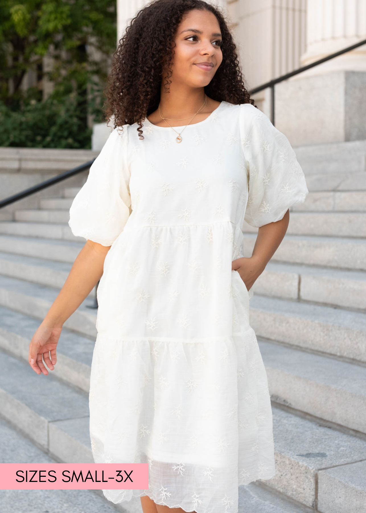 Cream floral puff sleeve dress with tiered skirt