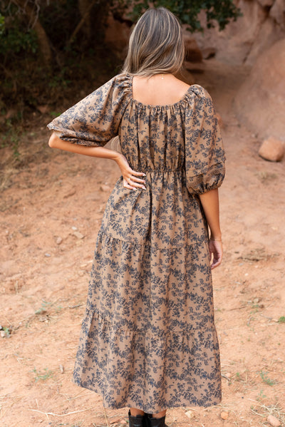 Back view of the brown floral tiered dress