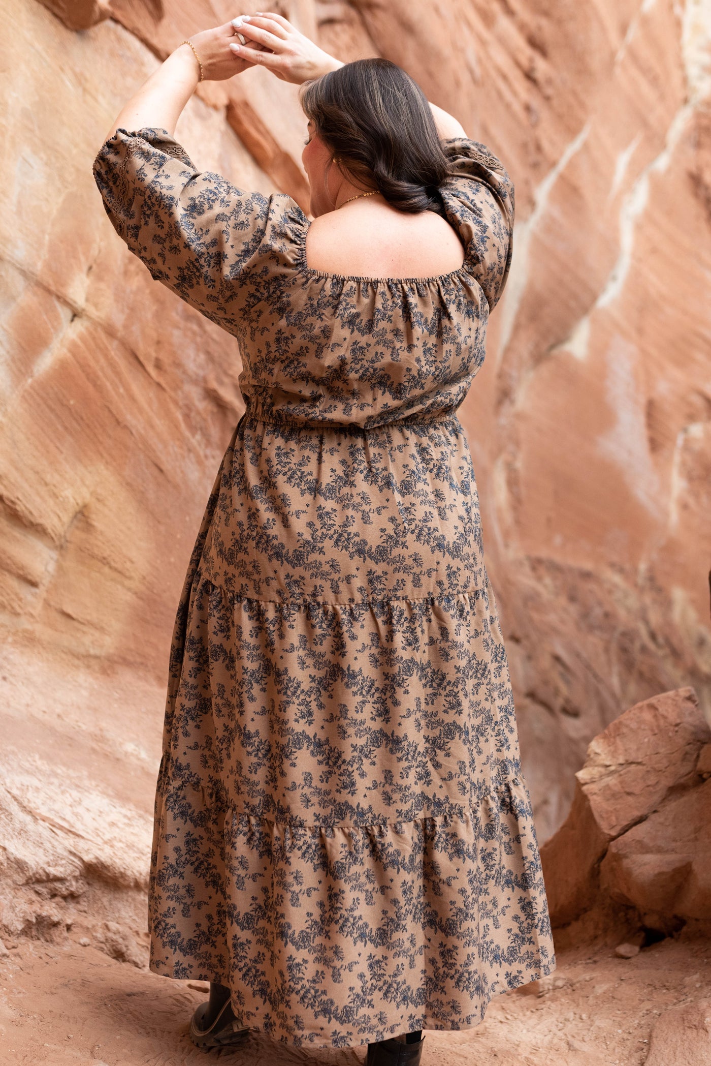 Back view of the brown floral tiered dress