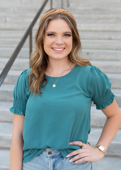 Jade green top with short sleeves