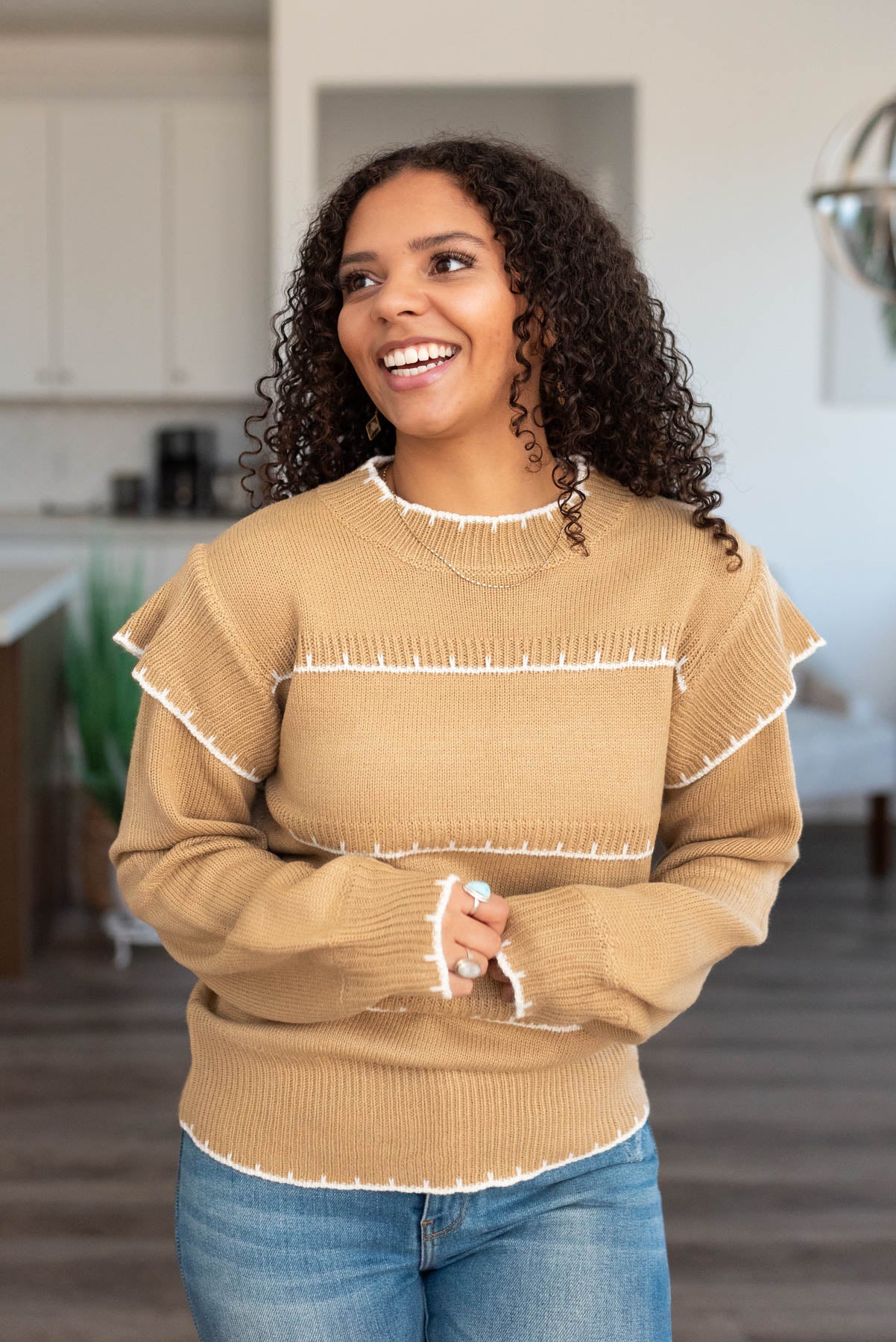 Taupe stripe sweater with long sleeves and white stripes