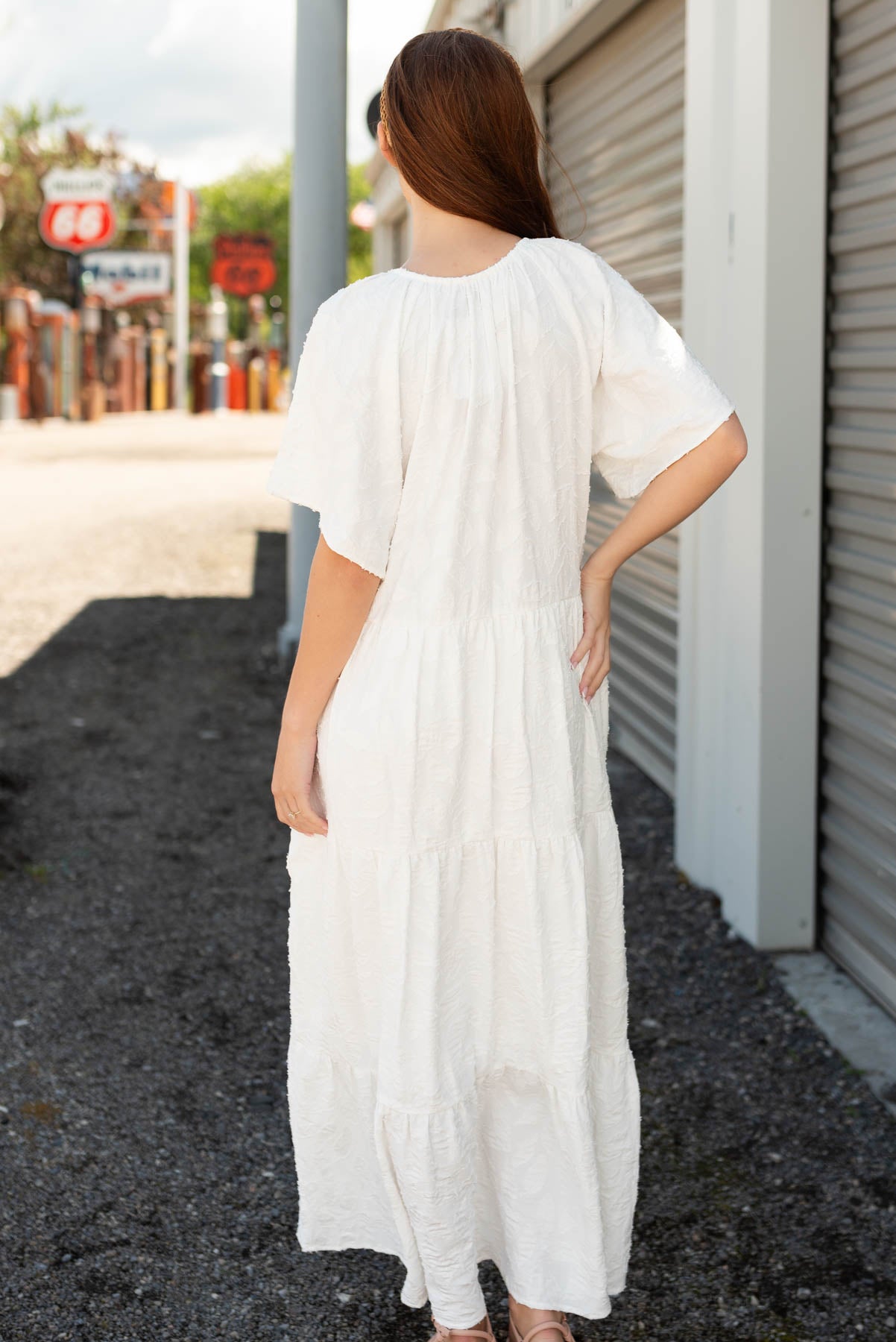 Back view of the white woven pattern dress