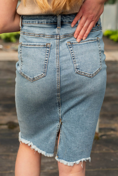 Back view of the indigo distressed skirt