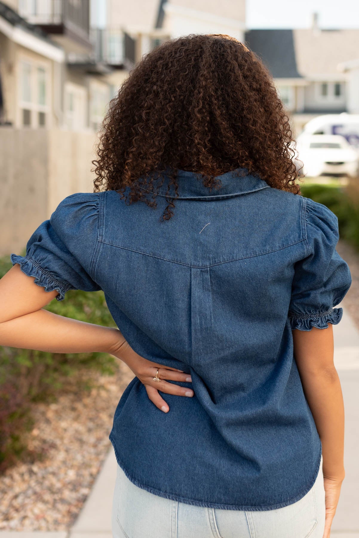 Back view of the denim puff sleeve top