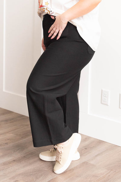 Side view of plus size black pants