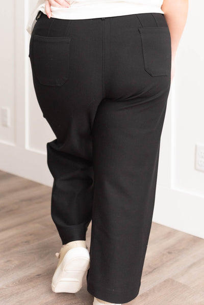 Back view of plus size black pants