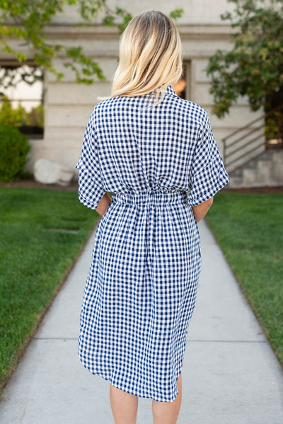 Back view of the navy plaid dress