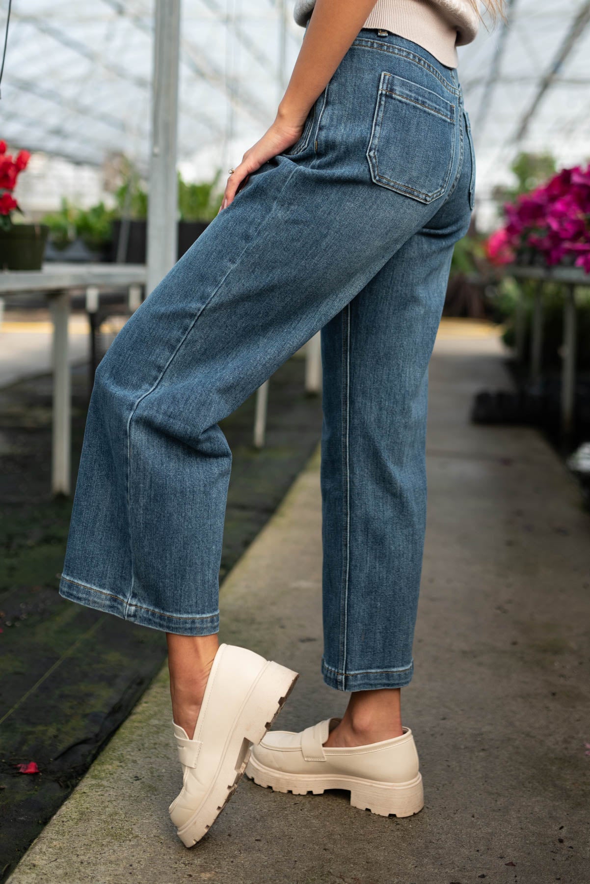 Side view of the denim straight leg pants