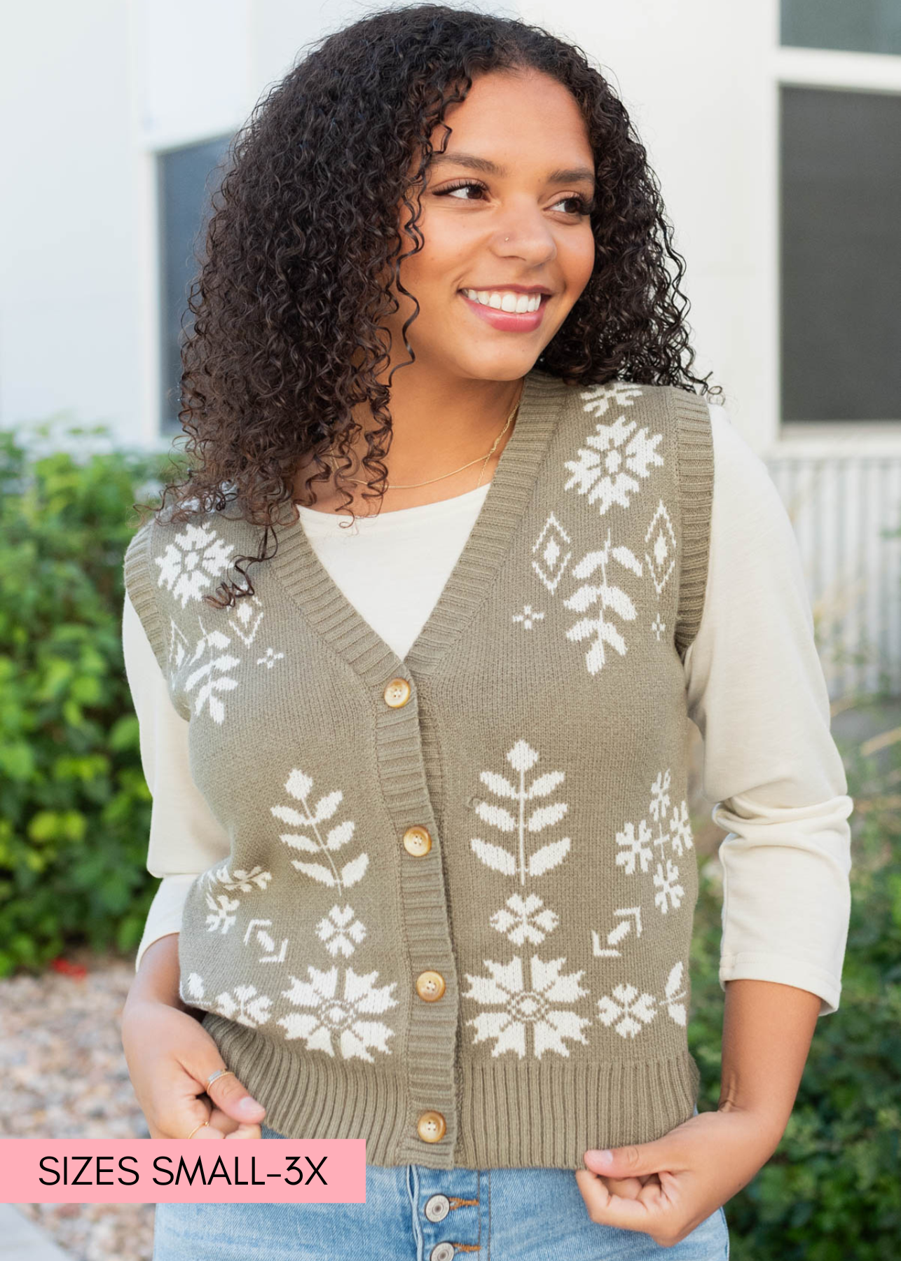 Front view of the light olive floral sweater vest