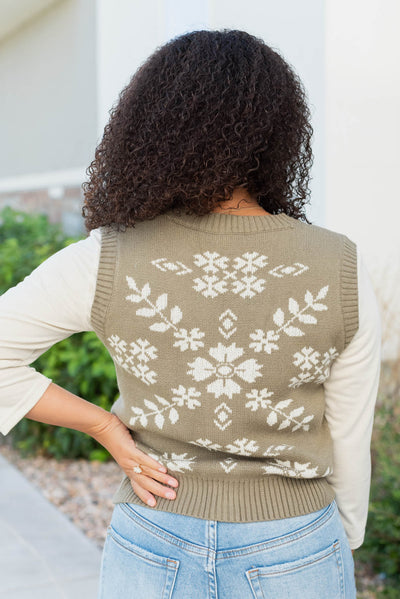 Back view of the light olive floral sweater vest