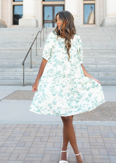 Green floral tiered dress with a square neck