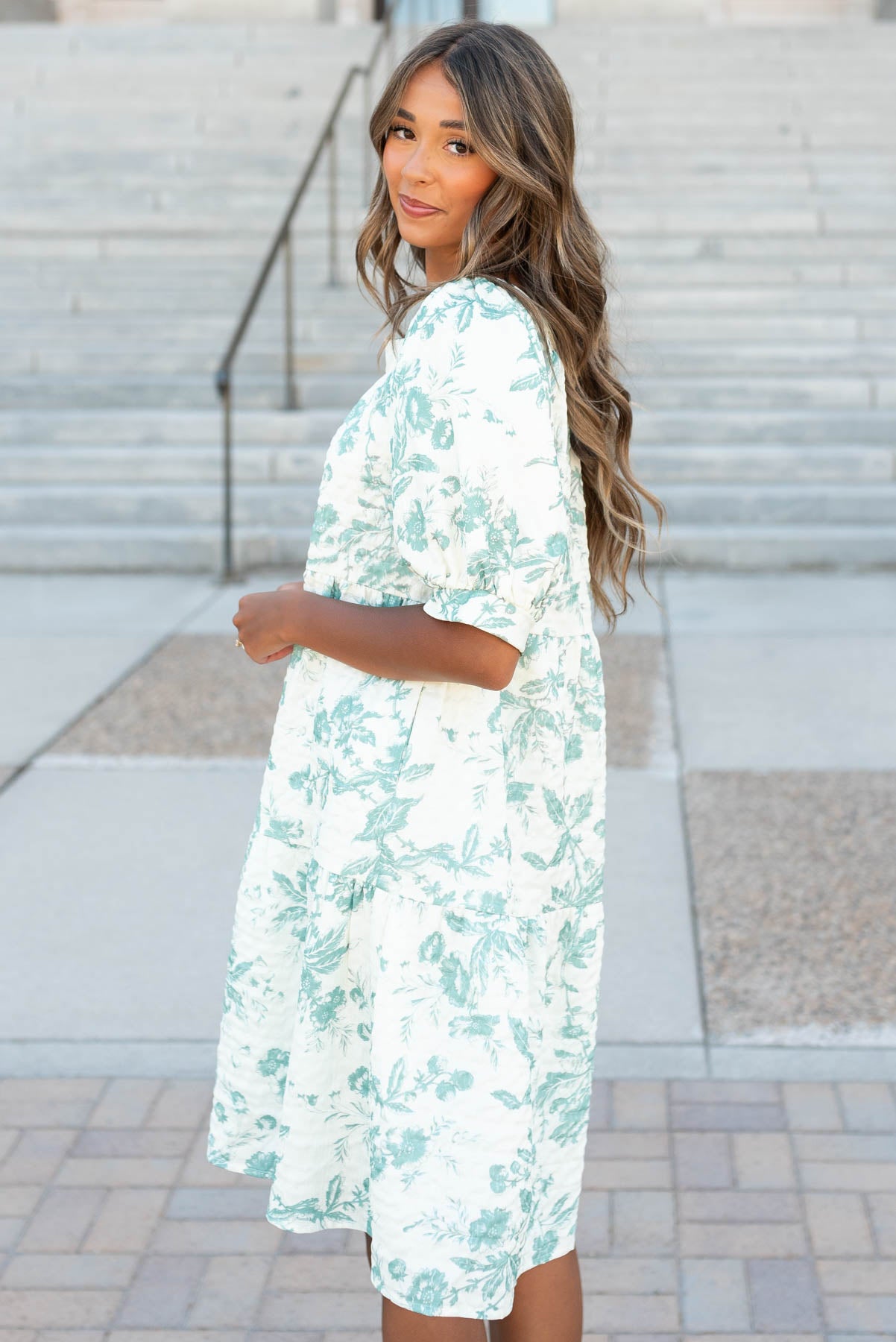 Side view of the gree floral tiered dress