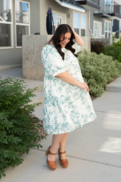 Green floral tiered dress with short sleeves