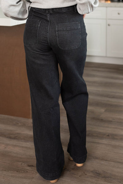 Back view of the black denim wide leg pants