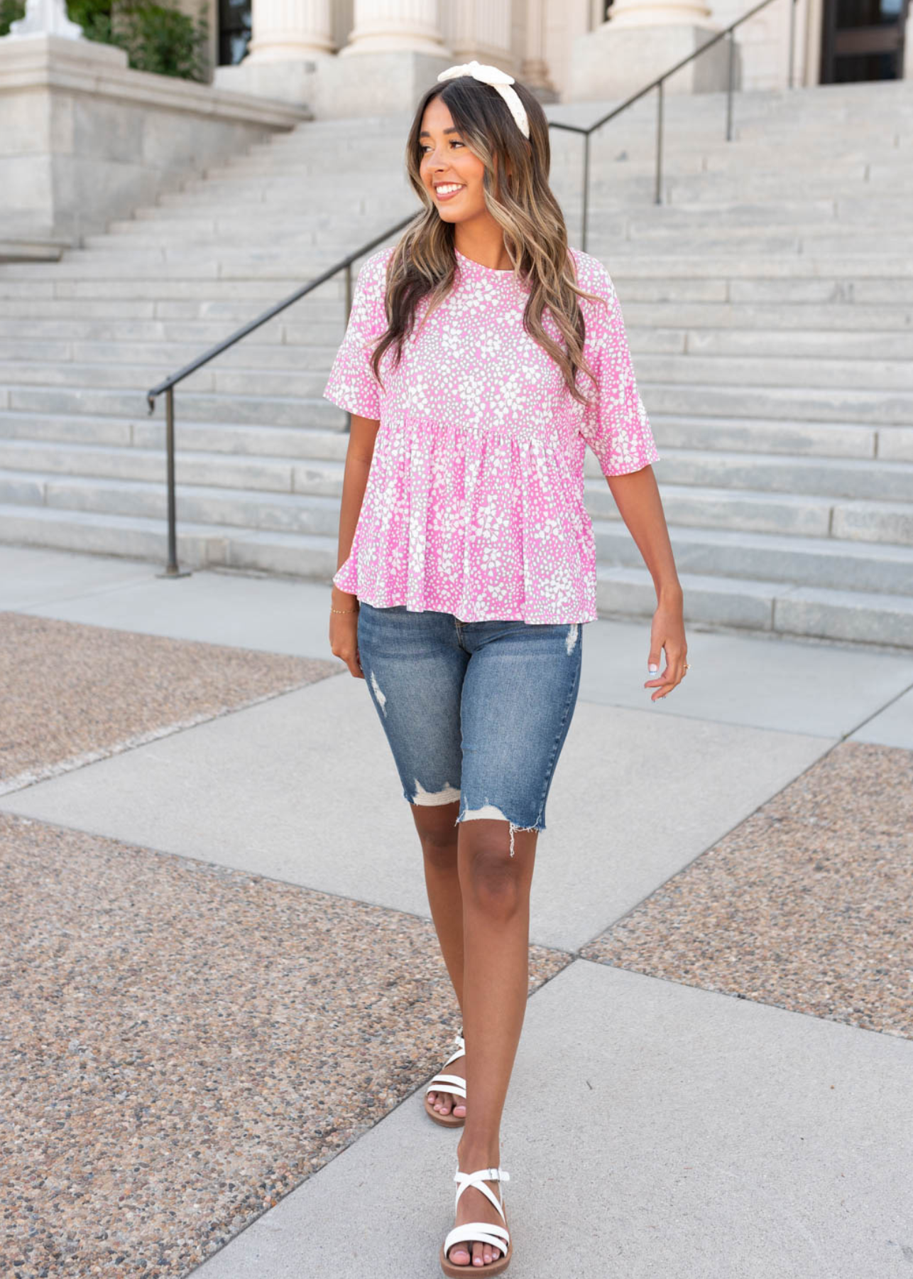 Pink floral pemlum top