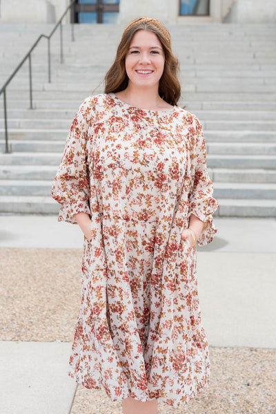 Cream floral tiered dress with pockets in plus size