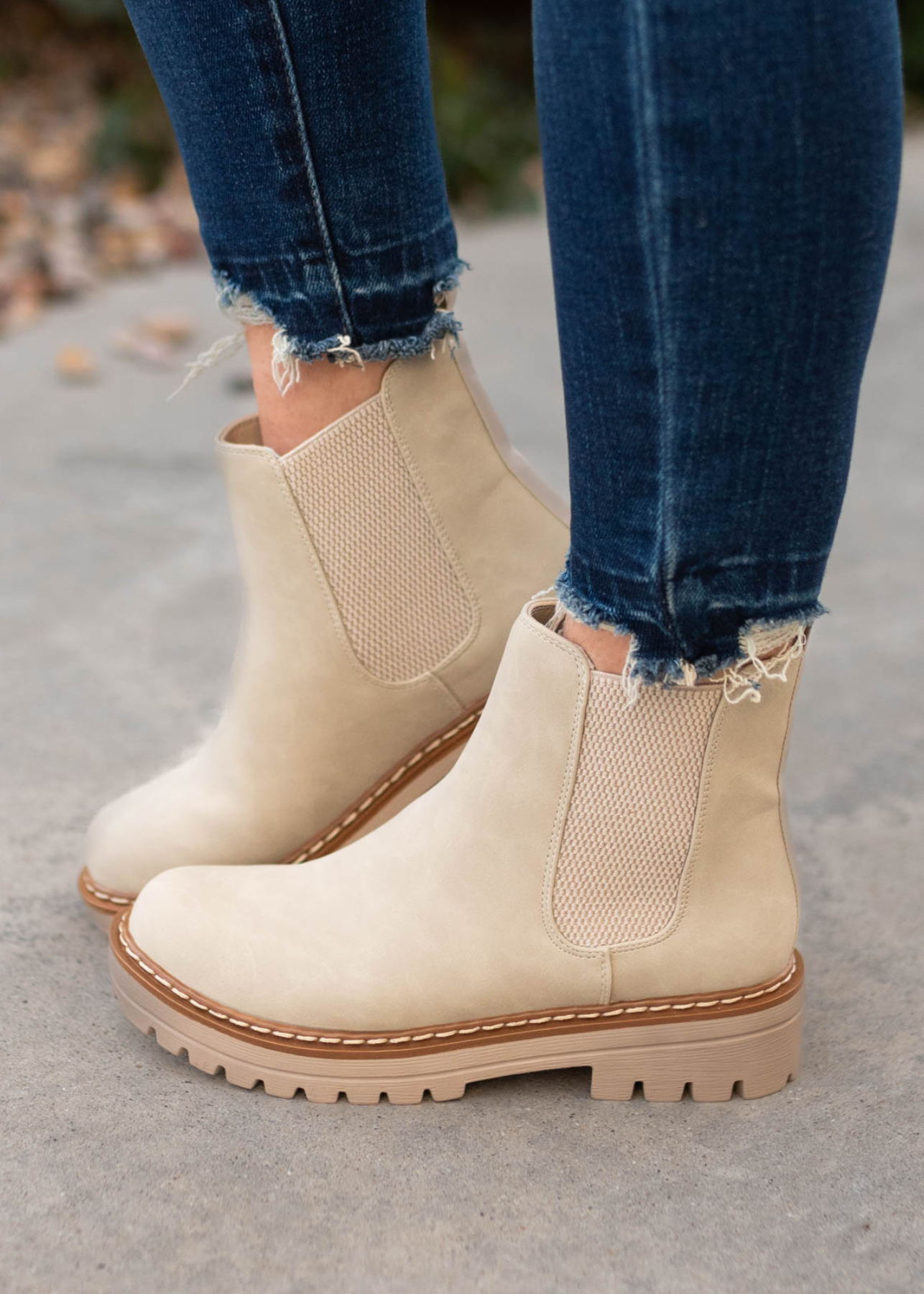 Side view of sand Chelsea boots