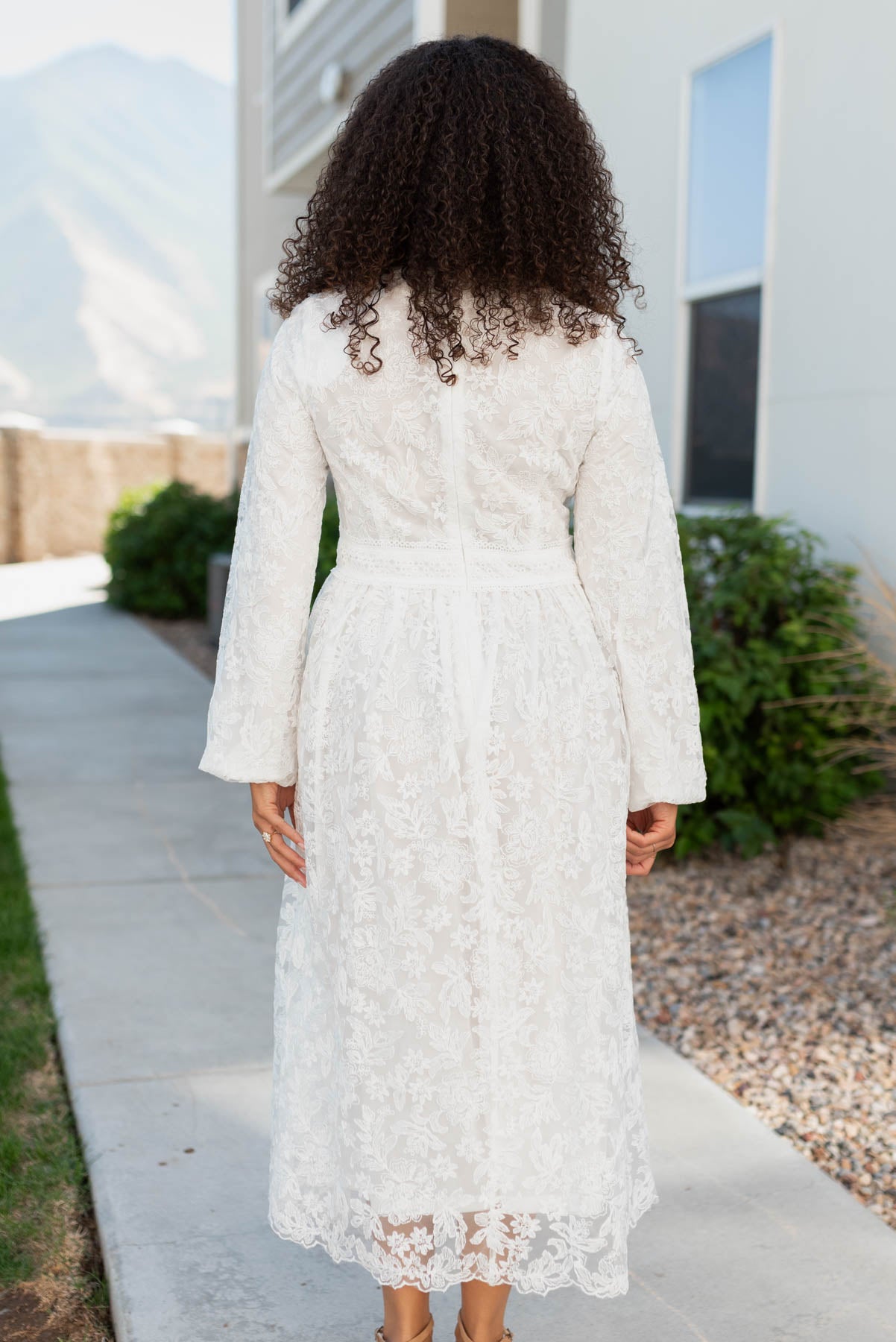 Back view of the white floral embroidered dress