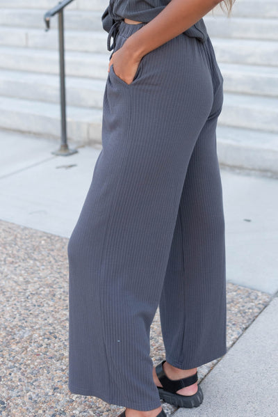 Side view of the charcole rib knit pants with pocket