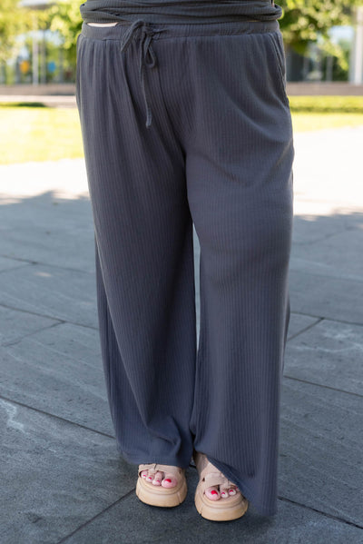 Elastic and tie waist on the plus size charcoal rib knit pants