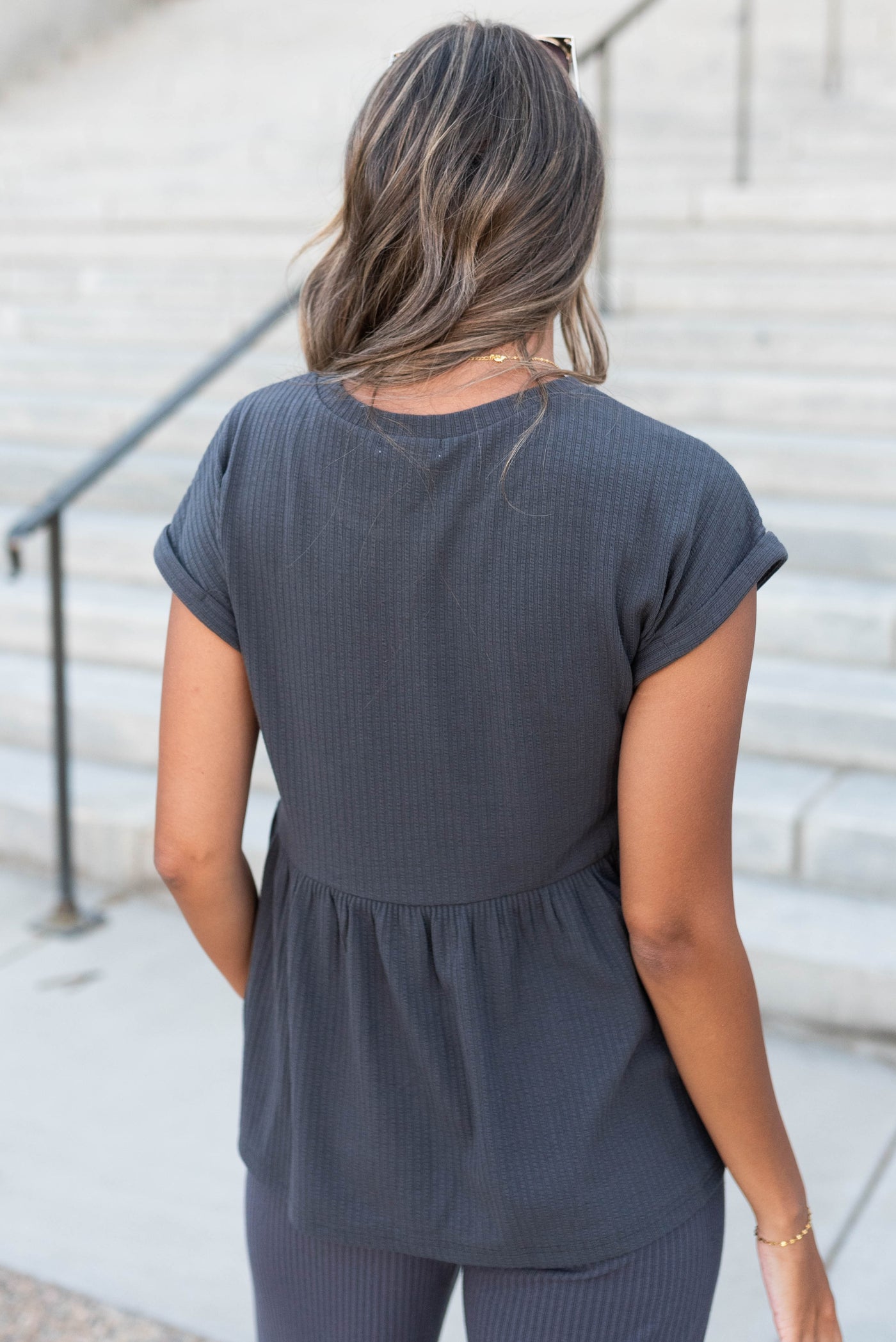 Back view of the charcoal rib knit top