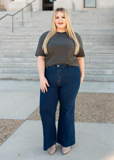 Front view of the plus size dark denim wide leg pants