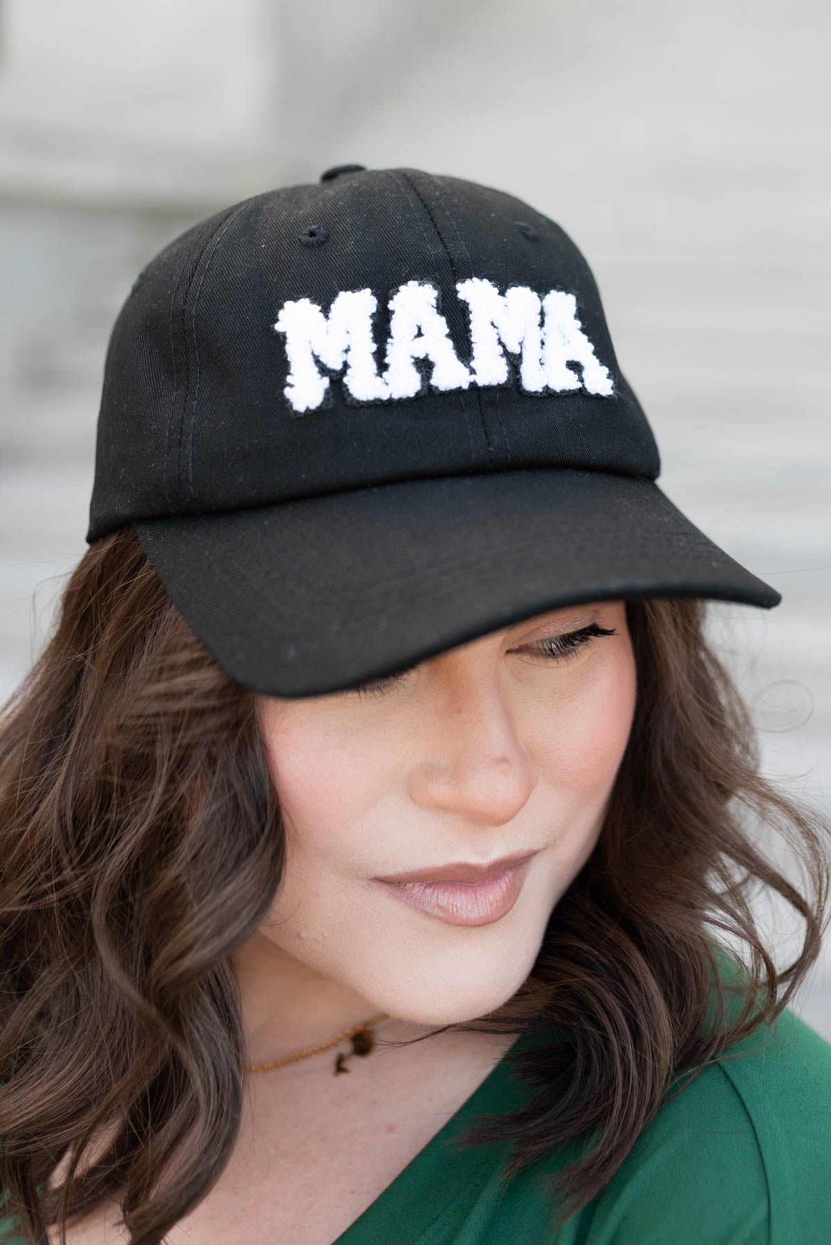 Side view of the black sherpa mama hat