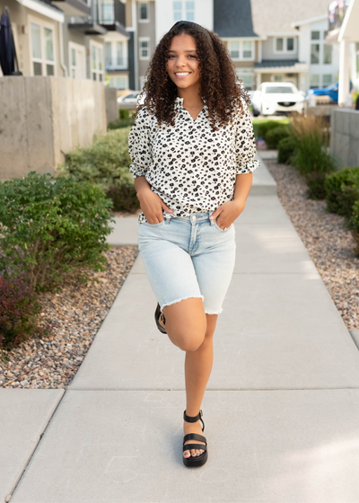 Black floral top with short sleeves