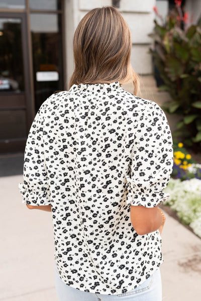 Back view of the black floral top