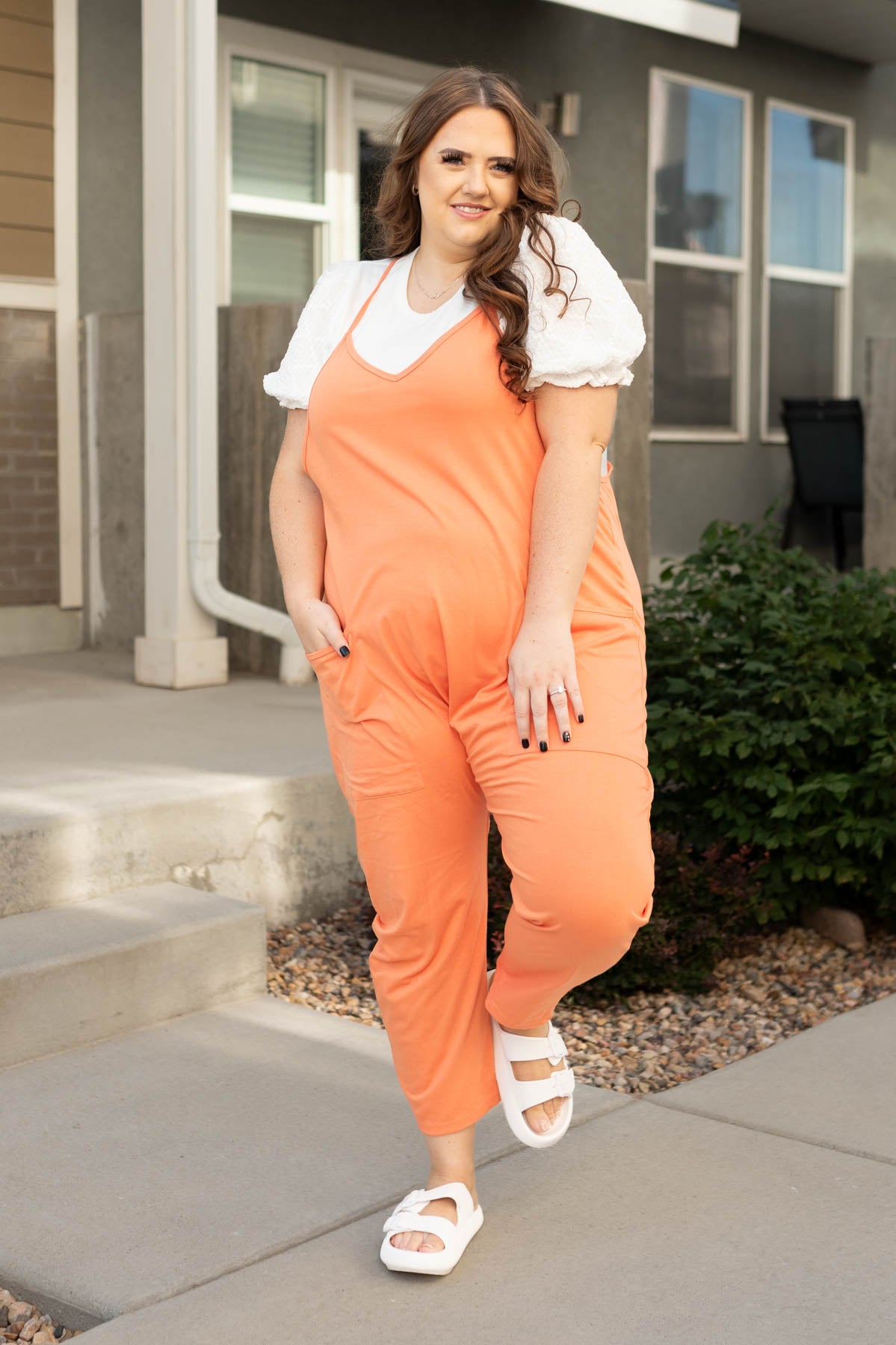 Plus size orange jumpsuit with pockets