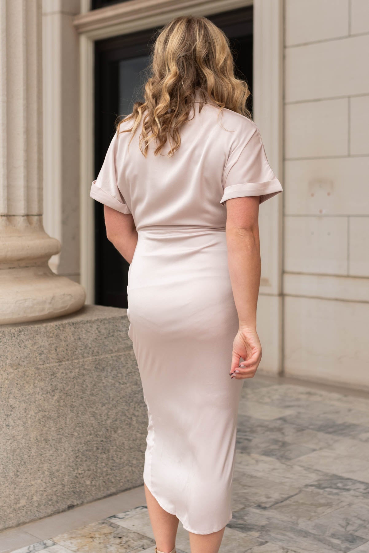 Back view of a champagne satin dress