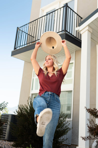 Medium girlfriend jeans with wine top that is sold separately