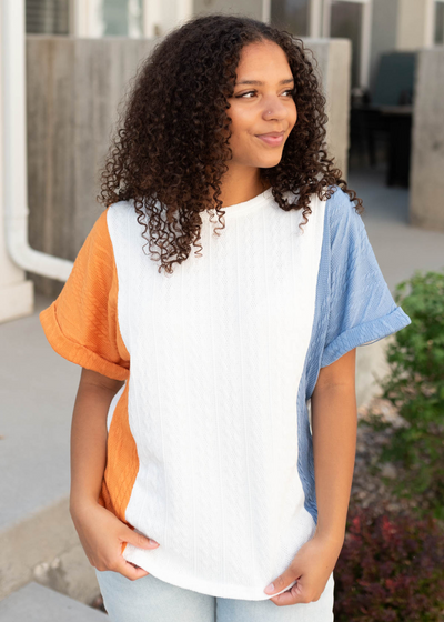 Blue orange color block top with cuff sleeves