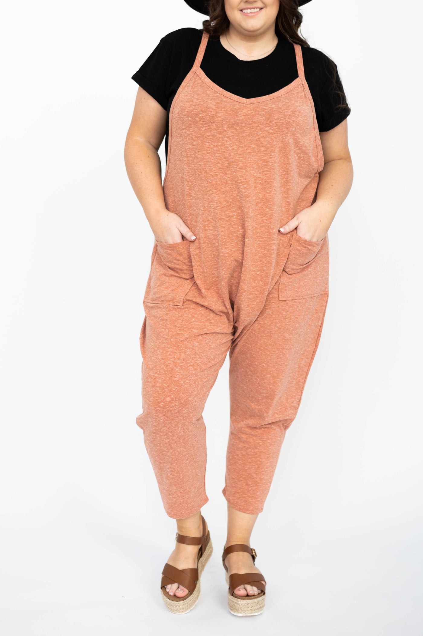 Plus size rust jumpsuit with pockets